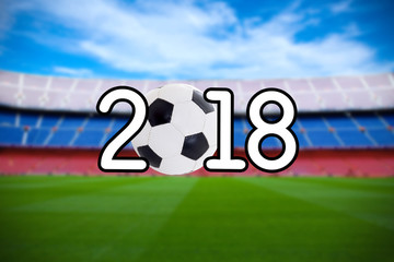 football 2018 background - blurred soccer field on the modern stadium