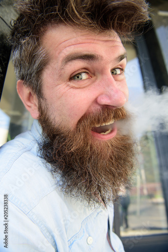 Hipster With Tousled Hair And Gray On Relaxed Cheerful Face With
