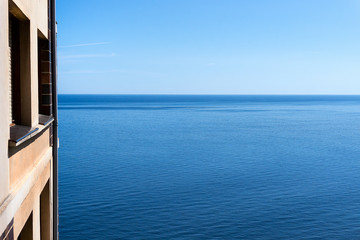 Wall Mural - Flat near the sea with blue sky