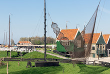 Traditional Houses Of A Fishing Village With Nets Drying In The Wind - Enkhuizen, The Netherlands