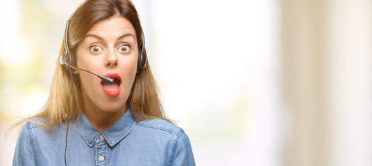 Poster - Consultant of call center woman in headphones scared in shock, expressing panic and fear