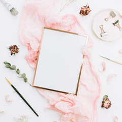 Wall Mural - Creative wedding composition with photo frame mock up, pink blanket, flowers, eucalyptus branches and brushes on white background. Flat lay, top view stylish art concept.