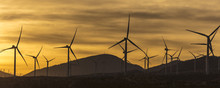 Windmills And Windpower At Sunset Outside Of Mojave, California