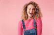 Close up portrait of smiling young girl with curly hair