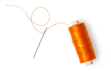 Spool Of Thread With A Needle