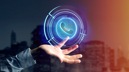 Poster - Businessman holding a Shinny technologic phone button - 3d render