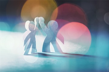 circle of paper people on abstract background