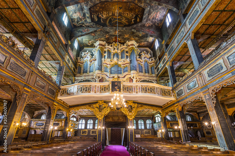 Interior of magnificently decorated wooden Protestant Church of Peace in Swidnica, UNESCO World Cultural Heritage, Poland. - obrazy, fototapety, plakaty 