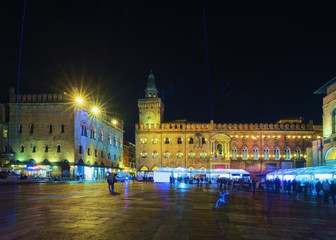 Wall Mural - People at Palazzo d Accursio in Bologna evening