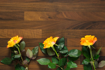 Wall Mural - yellow roses on the wooden table