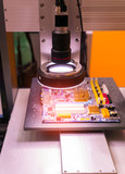 Fototapeta Paryż - Robotic vision sensor camera system in phone intellegence factory