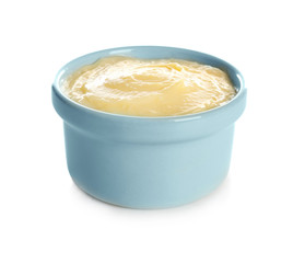 Poster - Tasty vanilla pudding in ramekin on white background