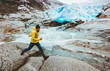 Running Man in glacier mountains travel adventure active healthy lifestyle endurance concept skyrunning extreme sport