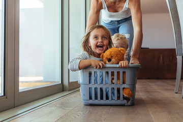 cute family playing together at home