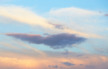 Wall Mural - quaint clouds in the sky before sunset.