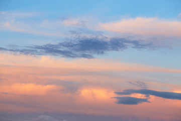 Wall Mural - quaint clouds in the sky before sunset.