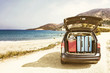 summer car with suitcase and beach landscape 