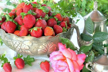 Strawberry in a beautiful vintage vase.