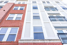 New Construction Exterior Pattern Of Apartment Condo, Condominiums Residential Windows With Brick Colorful Colors, Modern Siding In Virginia