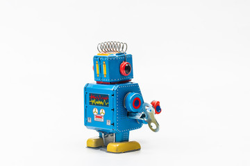 robot tin toy on white background