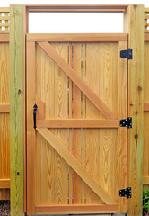 Wall Mural - Architectural construction detail. New wood fence gate door.