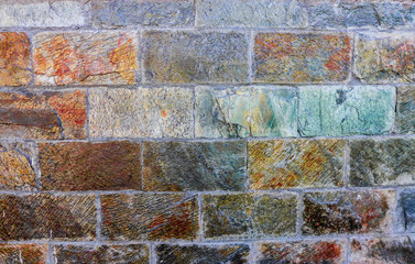 abstract colorful texture of stone wall background