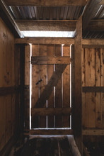 The Wooden Barn Door Through Which The Sunshine Breaks Through, Inside View