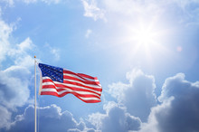 American Flag Against Blue Sky
