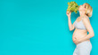 Woman in pregnant eating healthy vegetables salad and spinach