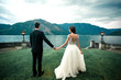 wedding couple the background of the lake and mountains