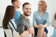 © Africa Studio - Handsome man at group psychotherapy session indoors