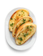 Poster - Plate with delicious homemade garlic bread isolated on white