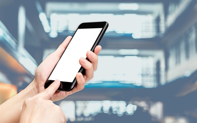 Aufkleber - Hand click mobile phone with blur bank counter at corridor hall way background bokeh light,White screen mock up template for adding your design or your text