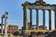 Ruins of Temple of Saturn and Capitoline Hill in city of Rome, Italy