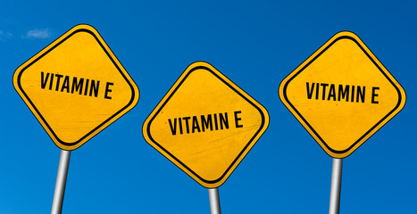 Wall Mural - Vitamin E - yellow sign with blue sky