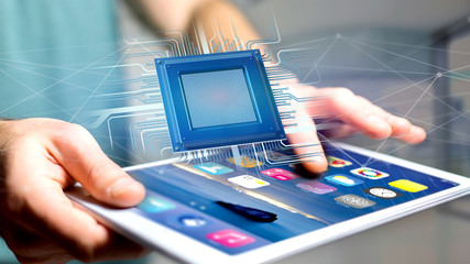 Poster - Businessman using a smartphone with a Processor chip and network connection - 3d render