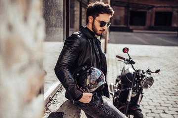 Canvas Print - Biker with modern motorcycle