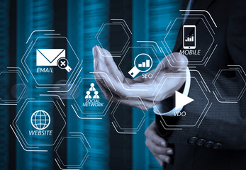 Poster - businessman hand  and server room background as concept