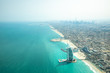 © Kertu - Aerial view of Dubai coast line on a beautiful sunny day.