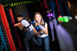 © JackF - Girl playing laser tag