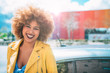 © DavidPrado - Mixed race woman in a multicolor background