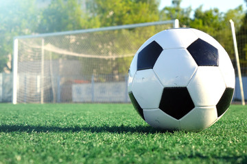 Football on a green field