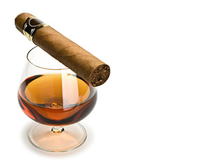 Cigar and cognac in a glass