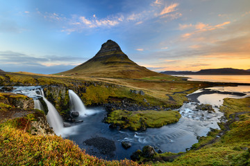 Amazing Icelandic landscape at the top of Kirkjufellsfoss waterfall with Kirkjufell mountain in the background on the north coast of Iceland Snaefellsnes peninsula