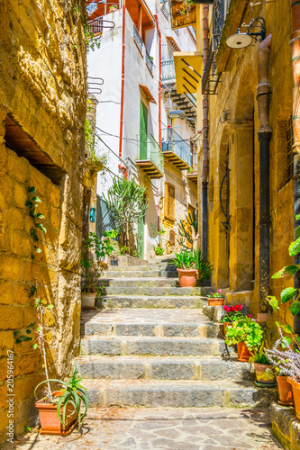 View of a narrow street in the historical city of Agrigento in Sicily, Italy
