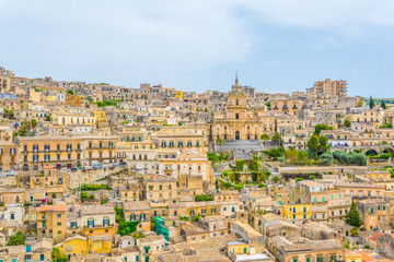 Wall Mural - Aerial view of modica overlooking cathedral of saint george, Sicily, Italy