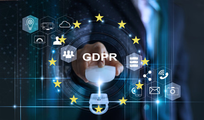 Wall Mural - Data protection privacy concept. GDPR. EU. Cyber security. Business man using mouse computer with padlock icon and internet technology network on blue background.