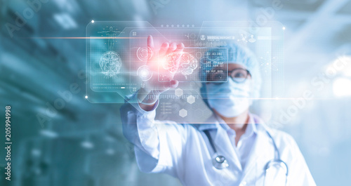 Fotomural Doctor, surgeon analyzing patient brain testing result and human anatomy on tech