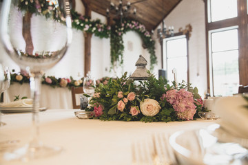 Wall Mural - wedding table in the restaurant with a lot of transparent glasse