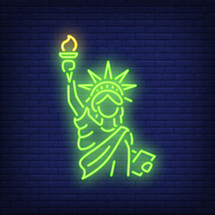 Wall Mural - Statue of Liberty on brick background. Neon style illustration